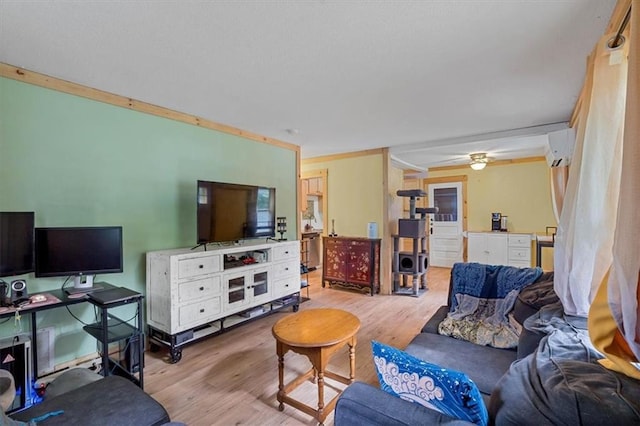 733 S Chestnut St, Olathe, KS 66061 - living room featuring wood finished floors, a wall mounted air conditioner, and a ceiling fan