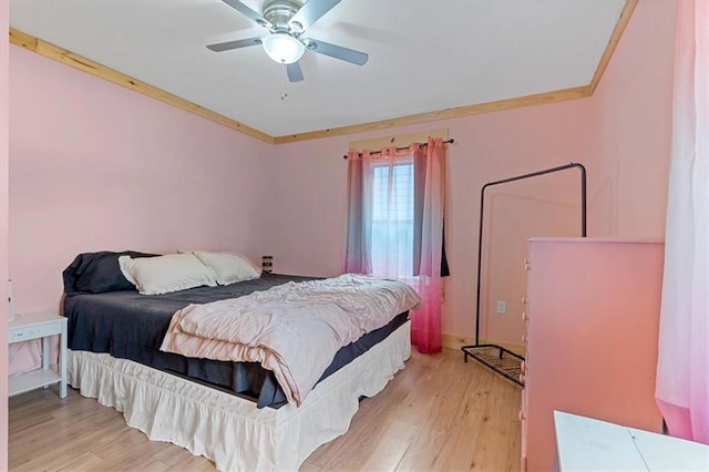 733 S Chestnut St, Olathe, KS 66061 - bedroom featuring light wood-style floors, ornamental molding, and ceiling fan