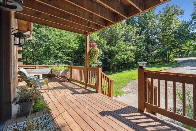 389 NW 1851st Rd, Kingsville, MO 64061 - wooden deck with a yard and view of wooded area