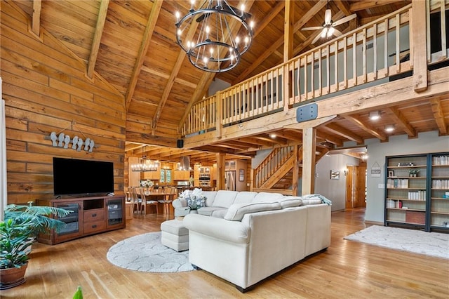 389 NW 1851st Rd, Kingsville, MO 64061 - living room with a chandelier, a wooden ceiling with exposed beams, stairway, hardwood / wood-style flooring, and high vaulted ceiling