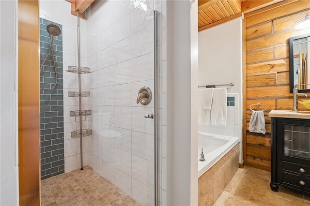 389 NW 1851st Rd, Kingsville, MO 64061 - bathroom with a shower stall, a garden tub, vanity, and tile patterned flooring
