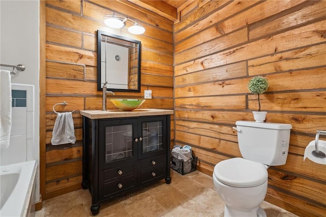 389 NW 1851st Rd, Kingsville, MO 64061 - full bath with vanity, a bathtub, and wooden walls