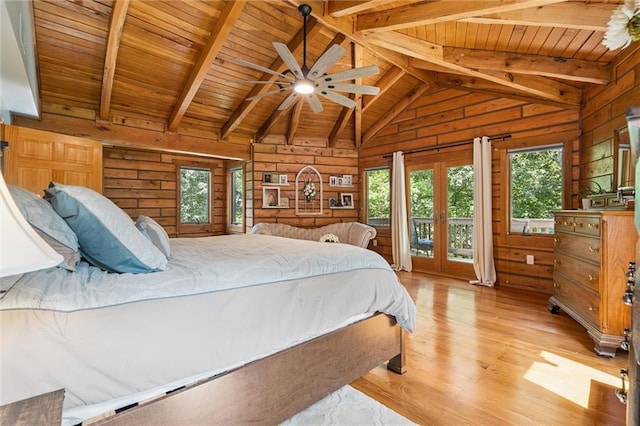 389 NW 1851st Rd, Kingsville, MO 64061 - bedroom with wooden ceiling, wooden walls, light wood-style flooring, access to outside, and french doors