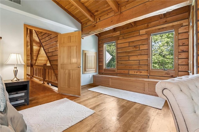 389 NW 1851st Rd, Kingsville, MO 64061 - living room with wooden ceiling, healthy amount of natural light, and wood finished floors