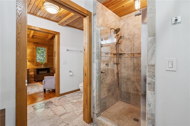 389 NW 1851st Rd, Kingsville, MO 64061 - bathroom featuring wood ceiling, a stall shower, and stone finish flooring