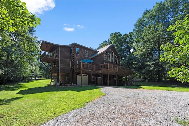 389 NW 1851st Rd, Kingsville, MO 64061 - view of front facade with driveway, an attached garage, a front yard, and a deck