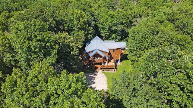 389 NW 1851st Rd, Kingsville, MO 64061 - aerial view of property and surrounding area with a heavily wooded area