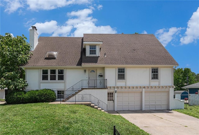 12731 Byars Rd, Grandview, MO 64030 - view of front of home with an attached garage, a chimney, a front yard, concrete driveway, and a shingled roof