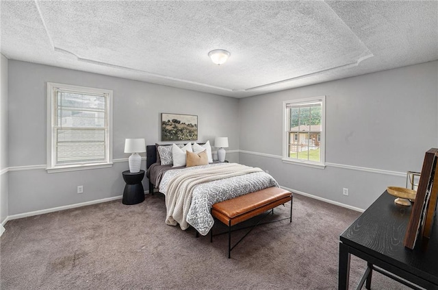 12731 Byars Rd, Grandview, MO 64030 - bedroom featuring a textured ceiling and carpet floors