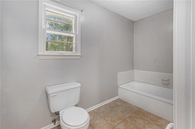 12731 Byars Rd, Grandview, MO 64030 - full bathroom featuring a bath and a textured ceiling