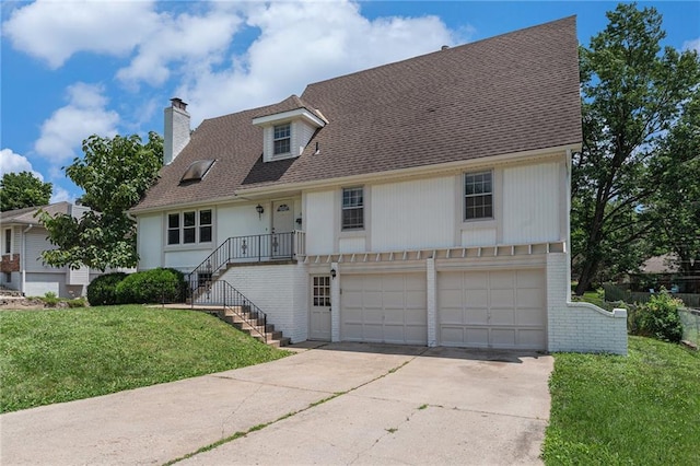 12731 Byars Rd, Grandview, MO 64030 - view of front of home featuring an attached garage, a chimney, concrete driveway, a front lawn, and stairs