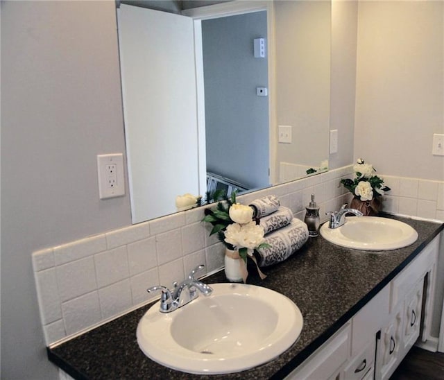 12731 Byars Rd, Grandview, MO 64030 - full bath featuring backsplash and double vanity