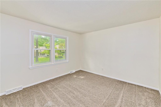 805 NW 18th St, Blue Springs, MO 64015 - empty room featuring carpet and baseboards