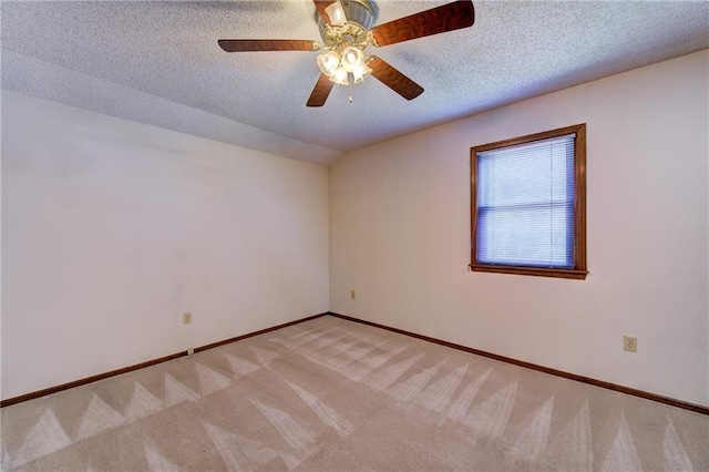 4008 NE 57th Ter, Kansas City, MO 64119 - unfurnished room featuring light carpet, a ceiling fan, and a textured ceiling