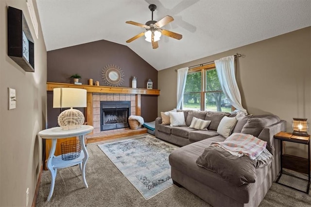 15509 Lawrence Ave, Belton, MO 64012 - carpeted living room with a ceiling fan, a fireplace, and vaulted ceiling