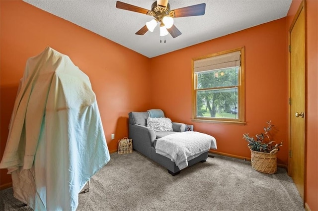 15509 Lawrence Ave, Belton, MO 64012 - carpeted bedroom with a textured ceiling and ceiling fan