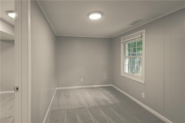 8167 NE 50th St, Kansas City, MO 64119 - empty room with carpet flooring and a textured ceiling