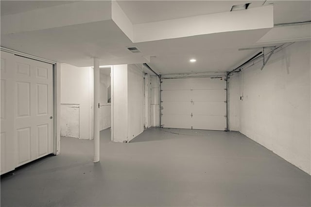 8167 NE 50th St, Kansas City, MO 64119 - garage featuring recessed lighting