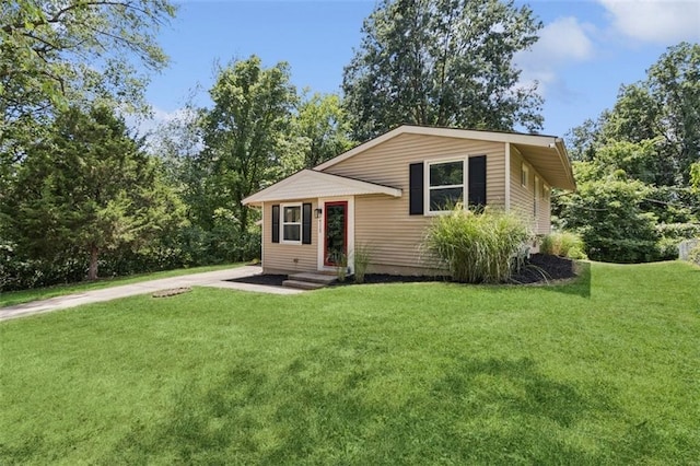 4112 N Hardesty Ave, Kansas City, MO 64117 - tri-level home with a front yard