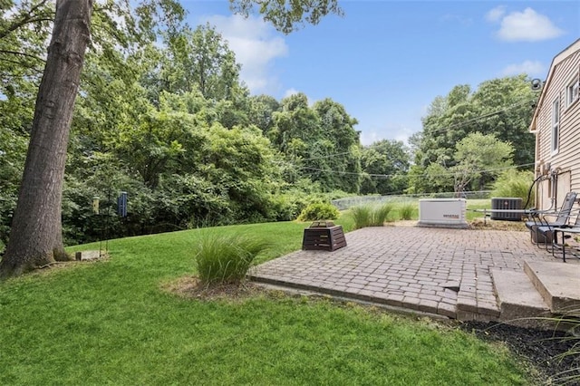 4112 N Hardesty Ave, Kansas City, MO 64117 - view of green lawn featuring a patio