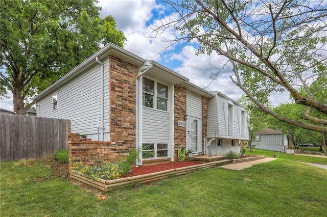 5101 NW Downing St, Blue Springs, MO 64015 - view of front of house featuring brick siding