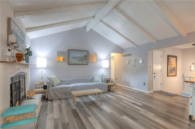 5101 NW Downing St, Blue Springs, MO 64015 - bedroom featuring wood finished floors and a brick fireplace