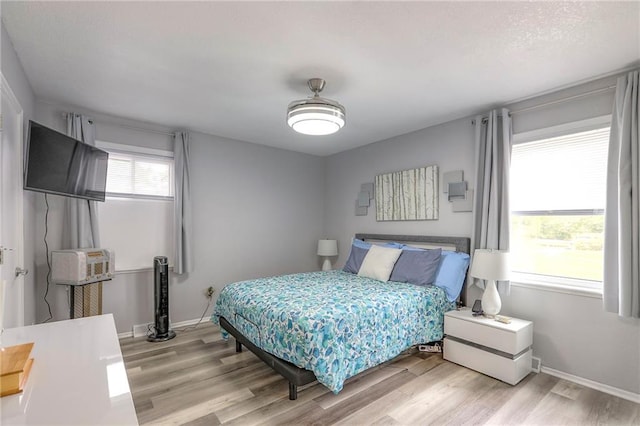 5101 NW Downing St, Blue Springs, MO 64015 - bedroom with light wood-type flooring