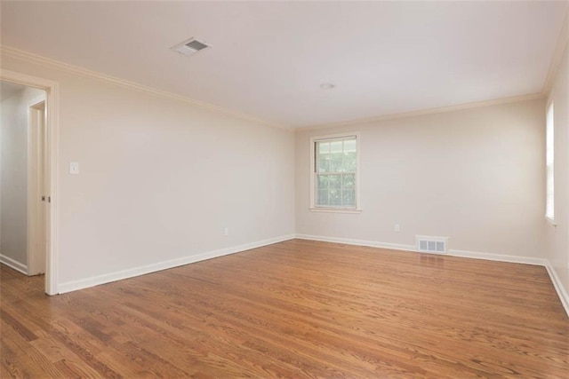 627 E Meyer Blvd, Kansas City, MO 64131 - empty room featuring crown molding and wood finished floors
