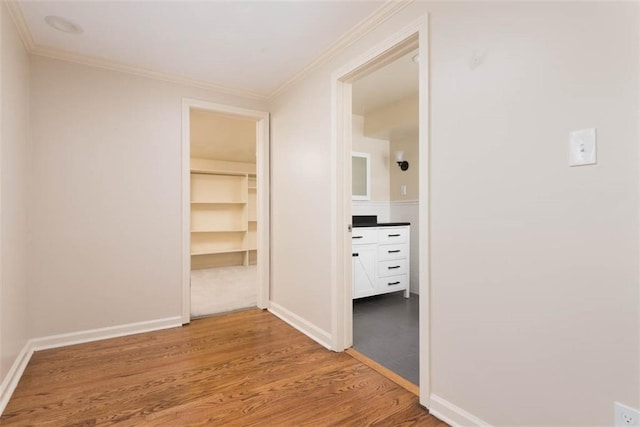 627 E Meyer Blvd, Kansas City, MO 64131 - hall with wood finished floors and crown molding