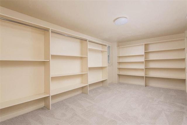627 E Meyer Blvd, Kansas City, MO 64131 - walk in closet featuring light colored carpet