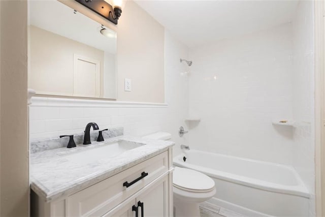 627 E Meyer Blvd, Kansas City, MO 64131 - bathroom with vanity, washtub / shower combination, and tile walls