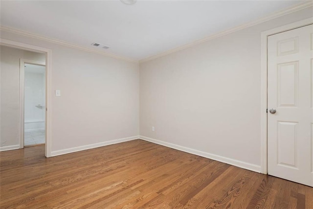 627 E Meyer Blvd, Kansas City, MO 64131 - empty room with light wood-type flooring and ornamental molding