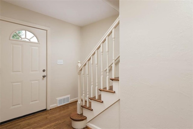 627 E Meyer Blvd, Kansas City, MO 64131 - foyer with wood finished floors and stairs