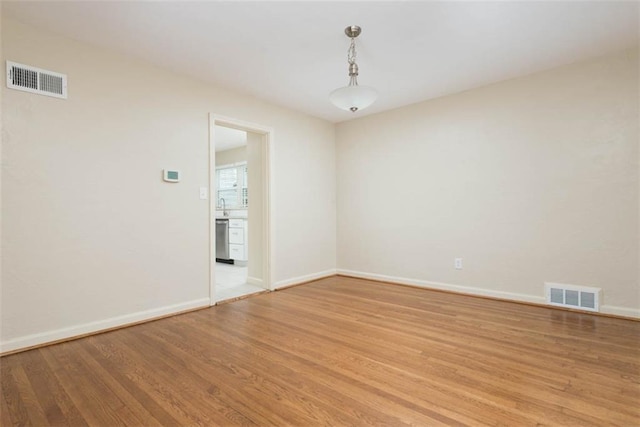 627 E Meyer Blvd, Kansas City, MO 64131 - unfurnished room with light wood-type flooring and baseboards