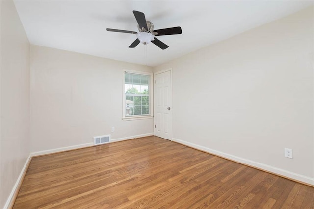 627 E Meyer Blvd, Kansas City, MO 64131 - spare room with light wood finished floors and a ceiling fan