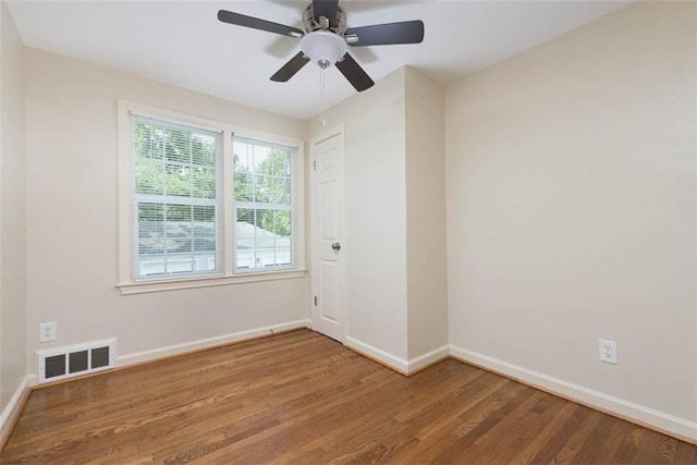627 E Meyer Blvd, Kansas City, MO 64131 - unfurnished room featuring wood finished floors and ceiling fan