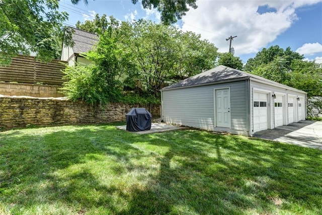 627 E Meyer Blvd, Kansas City, MO 64131 - view of yard with an outbuilding and a garage