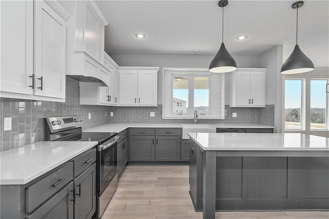 6114 Lewis Dr, Shawnee, KS 66226 - kitchen with stainless steel appliances, gray cabinets, light countertops, white cabinets, and recessed lighting