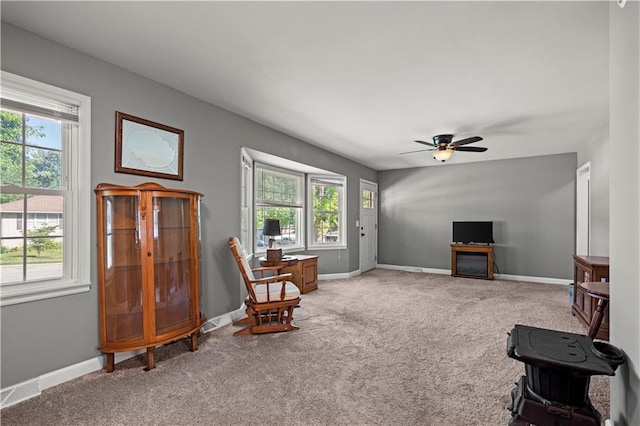 8315 Laurel Ave, Raytown, MO 64138 - living area with carpet and ceiling fan
