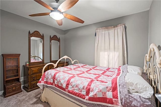 8315 Laurel Ave, Raytown, MO 64138 - carpeted bedroom featuring ceiling fan