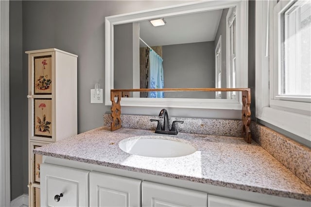 8315 Laurel Ave, Raytown, MO 64138 - full bathroom with vanity and curtained shower