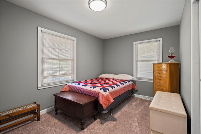 8315 Laurel Ave, Raytown, MO 64138 - carpeted bedroom with multiple windows