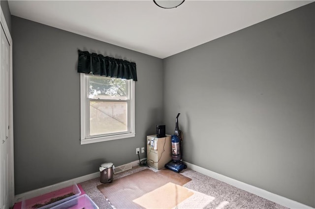 8315 Laurel Ave, Raytown, MO 64138 - carpeted spare room featuring baseboards