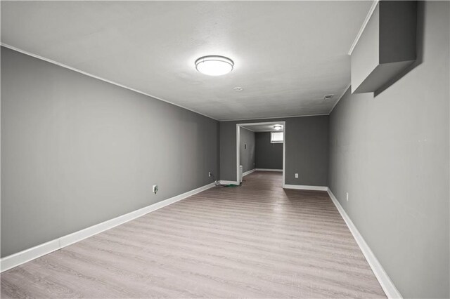 8315 Laurel Ave, Raytown, MO 64138 - empty room with wood finished floors and baseboards