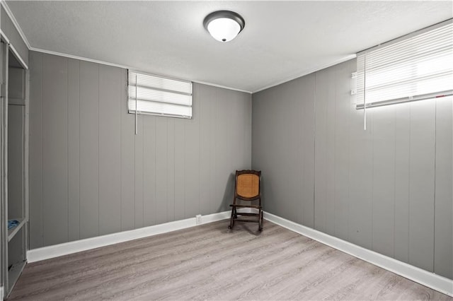 8315 Laurel Ave, Raytown, MO 64138 - below grade area with wood finished floors and baseboards