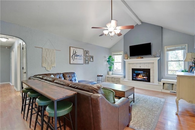 1211 SW Walnut St, Lees Summit, MO 64081 - living area with a ceiling fan, light wood-type flooring, plenty of natural light, and a tile fireplace