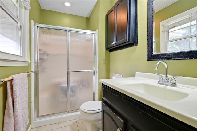 1211 SW Walnut St, Lees Summit, MO 64081 - full bathroom featuring vanity, healthy amount of natural light, a shower stall, and tile patterned floors