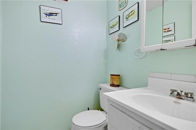 1211 SW Walnut St, Lees Summit, MO 64081 - half bathroom featuring toilet and vanity