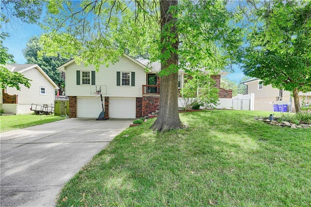 1211 SW Walnut St, Lees Summit, MO 64081 - view of front facade featuring a garage, brick siding, and concrete driveway