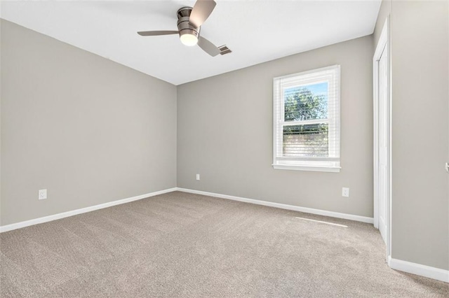 2623 W 131st St, Olathe, KS 66061 - unfurnished room with light carpet and a ceiling fan